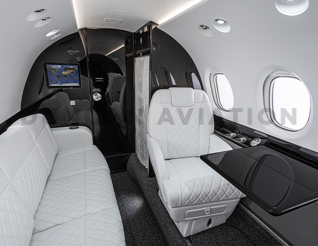 Interior of Hawker 800 with black lacquer and white leather