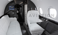 Interior of Hawker 800 with black lacquer and white leather